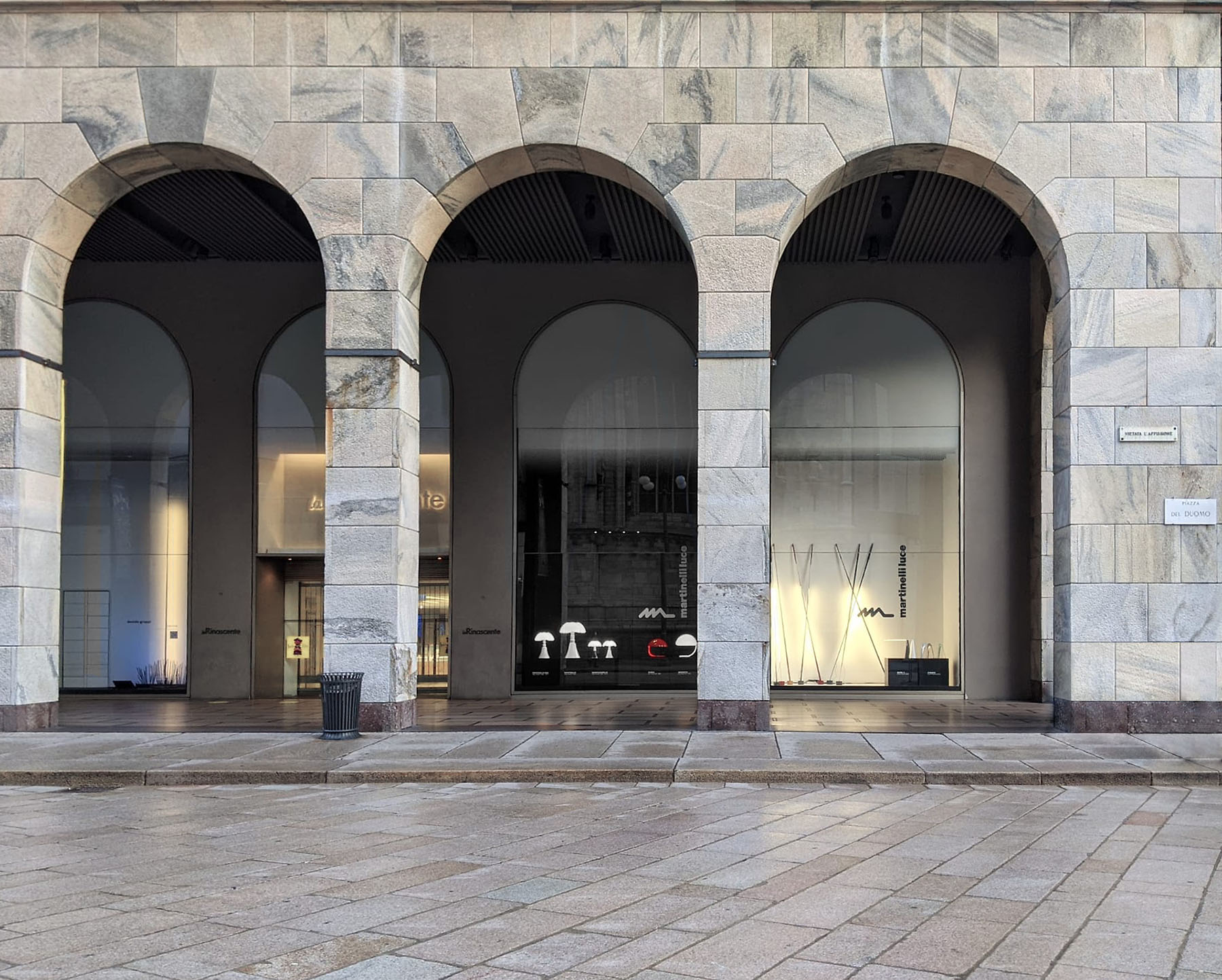 Martinelli Luce lamps light up the windows of La Rinascente in Milan