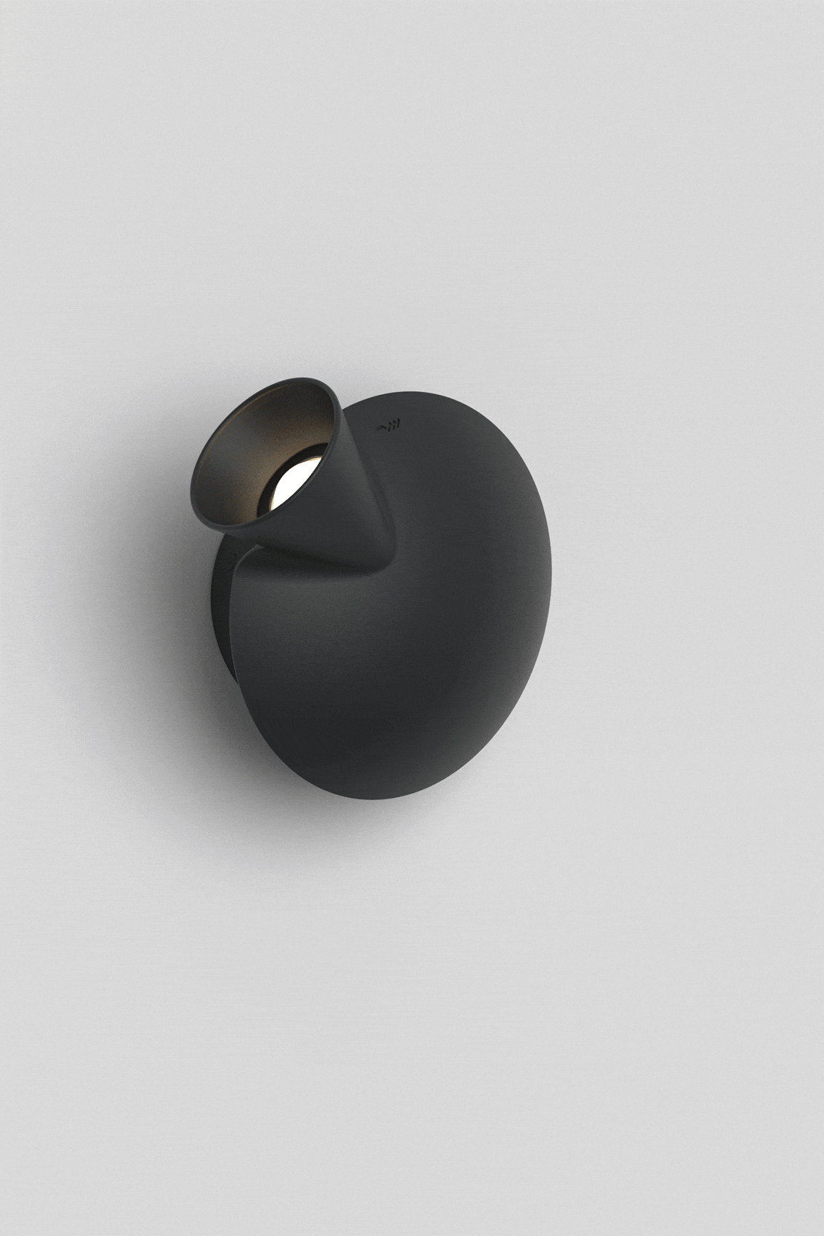 Tortuga, lampada da parete regolabile e minimalista.